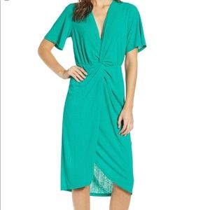 Green knit plunging v-neck maxi dress.